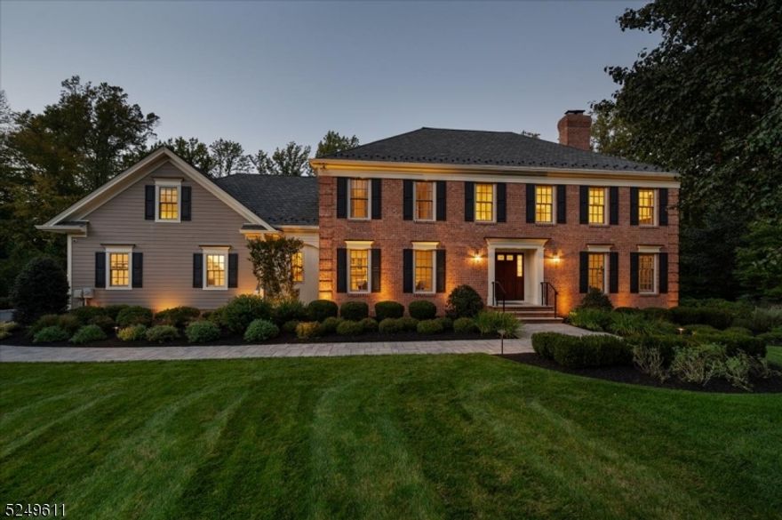 Pride in ownership is evident the moment you pull up to this perfectly maintained colonial. You'll be impressed with the brick facade, custom landscaping with uplighting, & location on a high-end cul-de-sac. You'll notice the quality of the updates when you see the stunning Grand Manor 50-year roof, Hardie Plank siding, and Anderson "A"  series windows with Azek trim. Once you walk through the foyer with porcelain floors, you'll realize how this home is made for entertaining. Cooking is a pleasure with the NEW Wolf induction range, steamer, wall oven, & warming drawer. Don't forget the Sub Zero refrigerator/freezer, and the Kitchen Aide appliances in the prep kitchen! Your guests will gather in the 29 ft long dining room with cathedral ceilings and a fireplace to warm up to. Everyday living is easy with a double-door first-floor office and a music room overlooking your private tranquil backyard. You'll feel elegant in the renovated bathrooms which have epoxy grout, stunning porcelain tile, and marble baseboards. You won't want to leave the Victoria and Albert tub in the master bathroom & you won't have to worry about hot water with 3 hot water heaters! The walkout basement can be used in various ways! With an updated full bath, three rooms with closets & still room for a ping pong table. The showstopper of this home is the private flat backyard. The three-tier blue stone patio & trex deck with built-in lighting will impress. This is a must-see!