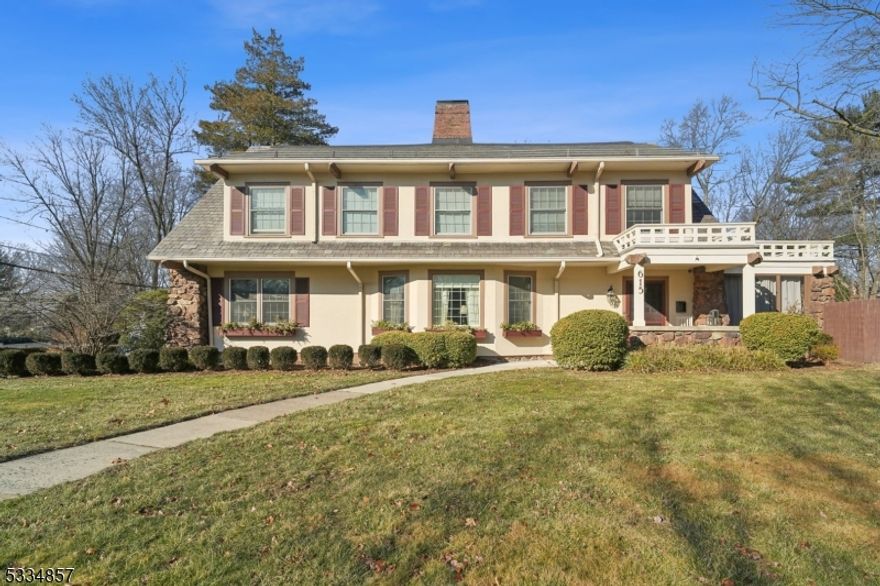 This exceptional sun filled colonial home seamlessly blends historic elegance w/modern amenities, offering spacious living & entertaining areas inside & out - large grand foyer - elegant soiree sized living room complete w/gas fireplace & gorgeous new marble surround - rounded front windows add an extra touch - den/office room w/built in bookcases & original wood paneled walls - the perfect WFH space - formal dining room w/built in dish cabinet & custom window seat - abundant space for holiday hosting - adjoining is a large & comfy family room to watch the latest streaming shows - french doors lead to a porch where you can enjoy a night cap - convenient mud room w/custom cabinetry & plentiful storage space - large bar area make preparing for your next party a breeze - custom chef's kitchen is the heart of the home - top of the line appliances - 5 burner stove - soapstone countertops - 2 wall ovens - center island w/brazilian cherry wood top - ample prep space perfect for effortless entertaining - 3 BRs on 2nd floor & full baths - plus oversized primary suite complete w/private spa bath - huge custom walk in closet & inviting space that includes sitting room area - 3rd floor has 2 large BRs - exercise room & full bath - lush private grounds w/many wonderful spots to enjoy the outdoors - beautiful stone patio - screened in porch & fenced yard - located within minutes to downtown Maplewood w/ NYC trains, restaurants, parks, shops & schools- Make this your forever home!