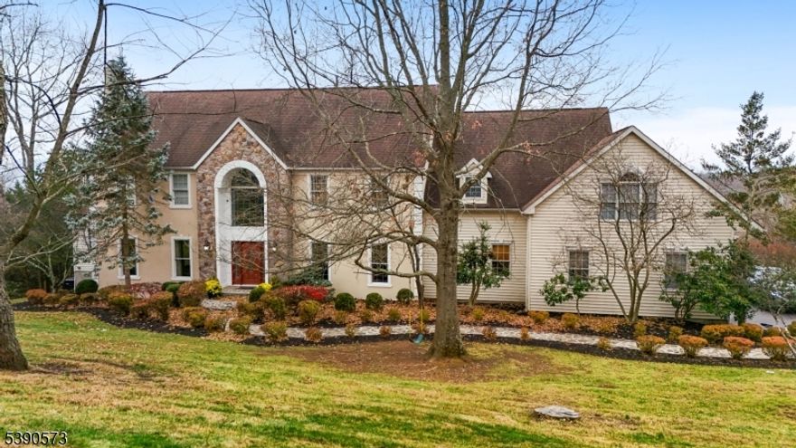 Welcome to 10 Blue Cliff Drive, an elevated and private residence accessed by a secluded uphill approach that enhances privacy. The sloped, wooded backyard offers excellent drainage and low-maintenance outdoor living.This 4,462 sq ft home features 4 bedrooms and 4.5 baths, set on 3.37 private acres in Clinton Township, Hunterdon County. A dramatic two-story staircase and newly painted living areas create a bright and welcoming entry.The main level includes a spacious first-floor bedroom/den with double closets and direct access to a full bath, offering flexibility for guests or a home office. The family room features two sets of sliding doors opening to an impressive 100-foot deck, ideal for entertaining and enjoying scenic views.The second floor includes a private in-law suite, providing flexible living space. Additional highlights include a granite kitchen, wet bar in the family room, and a walkout unfinished basement offering excellent potential for future living space. Located in an area known for top-rated schools and convenient highway access.