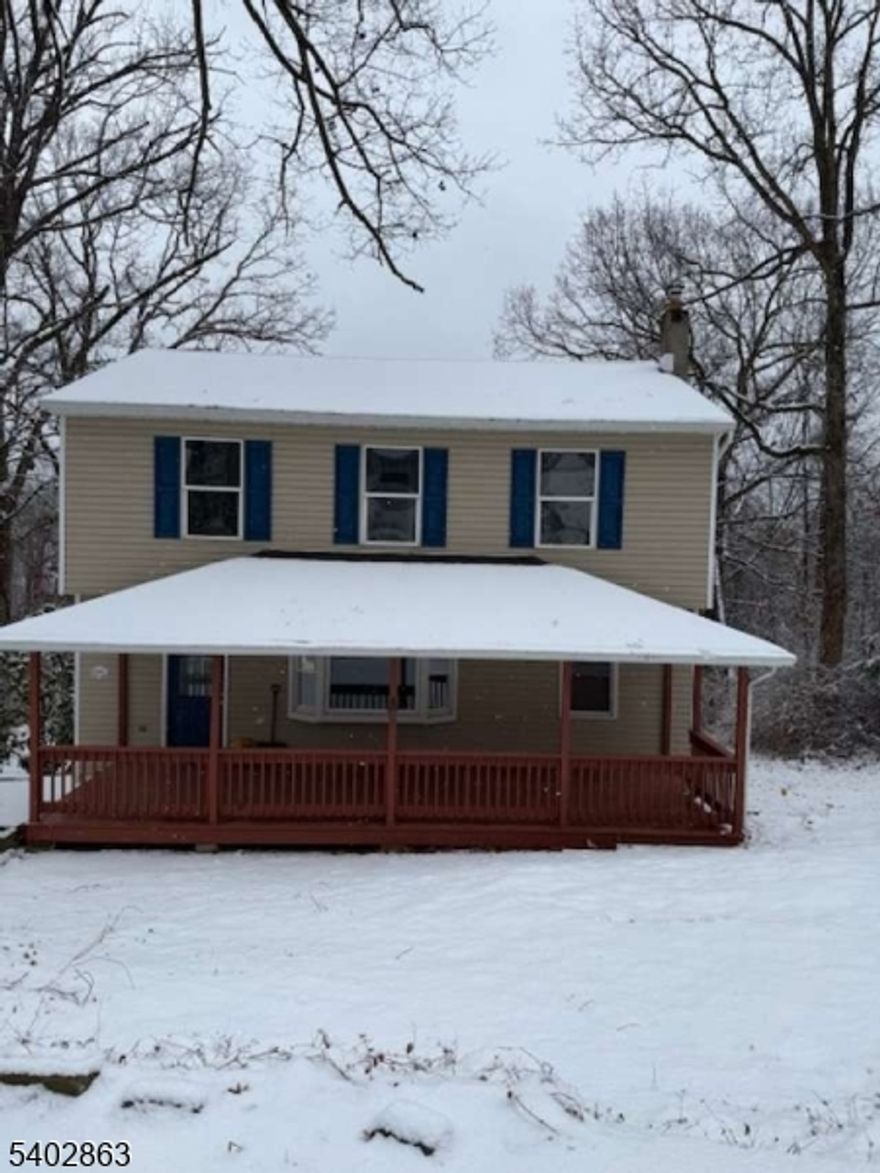 Welcome to this newly refreshed 4 BR 2 Full Bathroom home that's made for entertaining located in a very nice neighborhood close to a state park with a beach, fishing, swimming, boating, hiking and a picnic area on the lake. The location of this home is close to all major highways and shopping centers. This home is fully equipped with new kitchen cabinets accented with new quartz countertops including a coffee station. Enjoy all new stainless-steel appliances. Next to the kitchen is a dining area with sliding glass doors leading out to an oversized deck which overlooks a huge backyard with plenty of room to roam including a spot for a pool with needed electrical in place. Or use the fire pit while entertaining. Enjoy your privacy as this yard backs up to non-buildable woods. Inside, the first floor has a bedroom, a full bath, entrance foyer, living room, kitchen and a dining area. The 2nd floor has 3 bedrooms, two are very large, one has 2 closets, and another has a full bath. The entire house is freshly painted with new luxury vinyl flooring and new carpets in the upper bedrooms. The front of the house has a large, covered porch which makes this very inviting. This home also features a large basement accessible from the first floor with a door to the backyard. The basement is freshly painted and houses a brand-new natural gas hot water baseboard boiler for heat, a new water heater and a washer/dryer in place. This home also has a new roof. Just move right in.