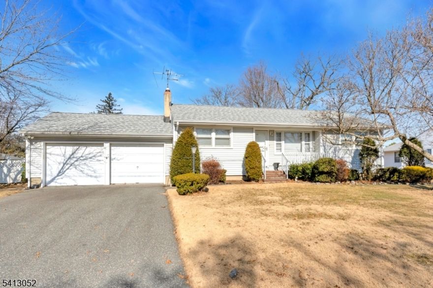 Welcome home! This spacious and well-maintained Ranch offers a comfortable layout and flexible living space in a desirable neighborhood. The main level features a cozy living room with hardwood floors, a bright dining room, and a kitchen with ample cabinetry and workspace. Three bedrooms and a full bath complete the first floor. The partially finished basement expands your options with a large recreation room, full bath, dedicated storage room, and laundry area ideal for additional space to enjoy hobbies or entertaining. Outside, enjoy a sizable fenced in backyard with patio space, mature trees, and plenty of room to create your ideal outdoor retreat. The home also features an attached two-car garage to keep all the snow off your cars and sits on a corner property offering added space and privacy. This is a great value for a very well-maintained home! A must see!