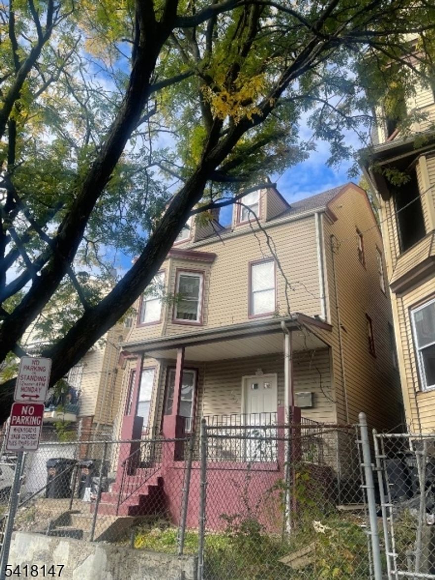 Welcome to Seymour Ave in the Clinton Hill Section of Newark NJ. This spacious multi- family home offers great bones and would be an investors dream. The first floor is occupied with a lease ending in June.it features 3 bedrooms. eat in kitchen, and 1 bath. The second floor features 2 bedrooms; living room, 1 bath. The 3rd floor features 1 bedroom, 1 bath, and a kitchen area.  There is no driveway but plenty of on-street parking, and a backyard with a front yard fence in area. Home will be delivered vacant. Located close to transportation and schools.  home does need some work so you have an opportunity to make it your home.
