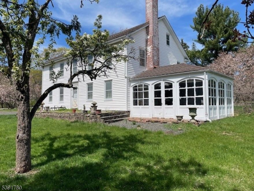 This lager Colonial sits on over 6+ acres and only minutes from Whitehouse Station commuter train, private but close to everything in a Mil+ subdivision, it offers large room sizes with lots of closet space, wide plank floors, 2 fireplaces in the living room, a 2 story barn and a nice size garage. Needs TLC rooms are approx. size, city gas in street, House to be sold AS IS!!