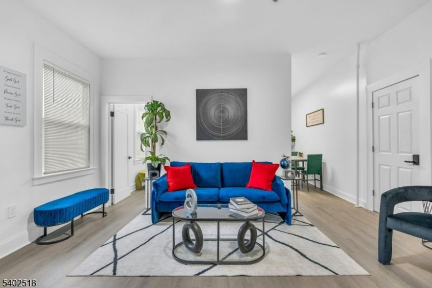 Move right into this fully furnished, 2-bedroom, 1-bath apartment home nestled on the 1st floor of a well-maintained two-family home conveniently located on a beautiful tree-lined street directly across from Bay Street train Station. This home offers unbeatable convenience for commuting into New York City and is just minutes from schools, shopping centers, fine dining, entertainment, major highways, and so much more to explore. Features include a private entrance, inviting living space, oversized primary bedroom, newly painted walls and premium vinyl flooring, modern kitchen with stainless steel appliances, porcelain-tiled full bathroom, picturesque windows throughout with brand-new blinds and ceiling fans for added comfort. Enjoy private access to the backyard and coin-operated laundry located in the basement. Tenant Responsible for First month's rent, 1.5-month security deposit, Renters insurance, pet fees and additional fees apply. Street parking is available with a permit obtained through the Township of Montclair (monthly fee applies). Small pets will be considered with a non-refundable pet fee & monthly pet fee may apply, if applicable. Short-term rental is okay. Asking price includes furnishings and ALL utilities and cable/internet plan.  Owner is a licensed Realtor.