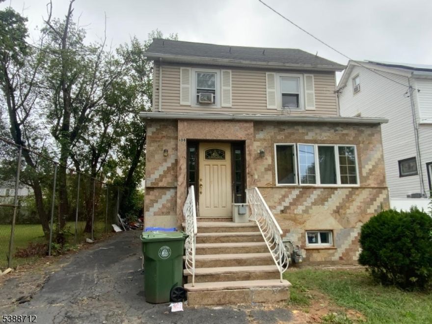 2 Apartments. Apartment #1, 2 bedrooms, living room, eat in kitchen and bath owner occupied. Apartment #2 + attic 3 bedrooms living room, eat in kitchen and bath. Carpet, ceramic floors, #1 steam heat #2 HVAC, separate utilities garage needs repairs, bsm with plumbing bathroom, 1 room utility room, 2 hot water tanks.