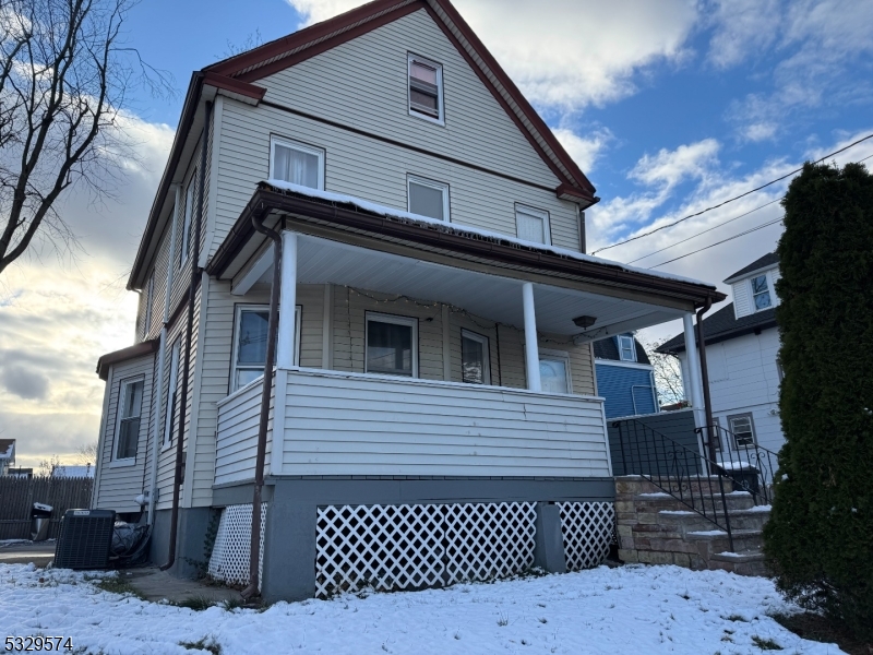 A recently renovated house in the heart of Plainfield, this is an excellent location. It is near supermarkets, public transportation, and houses of worship, about 10 minutes away from major highways. This home features 4/5 bedrooms, 2 bonus rooms in the basement with a full bathroom and independent entrance, Quartz countertops, stainless steel appliances, ceramic flooring in the kitchen, hardwood floors throughout the house, a fully finished attic with a full bathroom, a newer multi-zone HVAC system, and all new plumbing and electric. There is room for everyone in this home. Walk out fully finished basement with separate entrance LOW TAXES,  HOUSE IS SOLD IN "AS IS" CONDITIONS, NO KNOWN ISSUES.