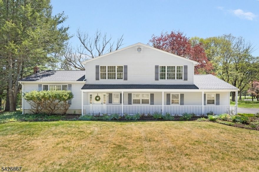 Spacious 3132 square foot, 15 room, 4-5 bedroom, & 2.5 baths with abundant natural light on a 1 acre corner lot in a lovely town and quiet neighborhood. A short stroll to award-winning public schools, public library, and shopping center. Stately living/dining room 28x18 with magnificent wood burning fireplace and beautiful walkout french doors. Great for entertaining and family gatherings. Large kitchen with soapstone countertops, full sized breakfast area, venting skylight, and double sliding door access to large deck. Open 21x13.5 family room connected to the kitchen. 4 large bedrooms: Primary 18x15 with bathroom and an 11x6 walk-in-closet; Bedroom 17x10 with 10 foot closet; Bedroom 14.5x13.5 with an 8x6 walk-in closet; and Bedroom  21x12.5 with beautiful bay window and 8 foot closet. First floor home gym, 16x13, with over $4000 in equipment. Can be a fifth bedroom. Inviting, warm hardwood oak floors offer a seamless, durable, and classic look. Two zone HVAC, provides greater comfort and control. Abundant storage: a large mudroom with 13 feet of closets, upstairs laundry room with 6.5 feet closet, a 6' customer kitchen pantry, and exceptional closet space in the bedrooms. Large attached two-car garage with new doors and electric openers. Lovely landscaping and a 35x30 fenced-in garden. Attached 12x11 sport shed for bicycles and lots of other equipment, keeping everyone active and garage uncluttered. New asphalt roof and new rafters January 2024. Offers due 5/5 by 9pm