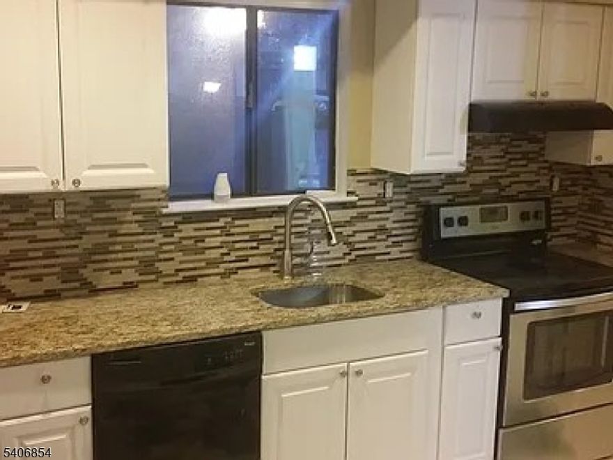 Beautiful 2 Bed plus loft, 2.5 Bathroom with vaulted Ceiling, bi level floor view from loft to living room ,attached garage and basement. Remodeled Kitchen with new Cabinets and appliances. Fully Renovated Master Bathroom. All other Bathrooms updated. Quiet and nice backyard view.  Owner Pays association