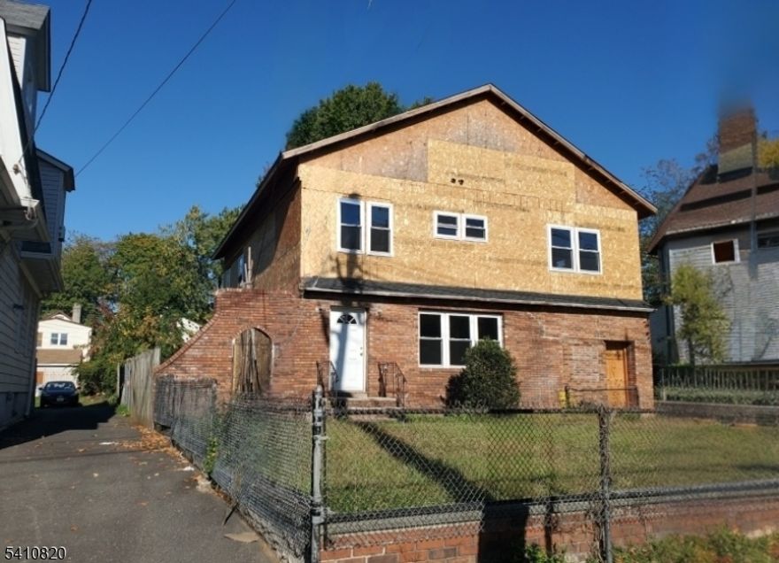 ONE OF A KIND OPPORTUNITY TO PURCHASE A LARGE HOME IN A GREAT PART OF TOWN READY FOR YOUR CUSTOM FINISHING!  HUGE LOT WITH PLENTY OF BACKYARD SPACE.  PROPOSED PLANS AVAILABLE FOR REVIEW.