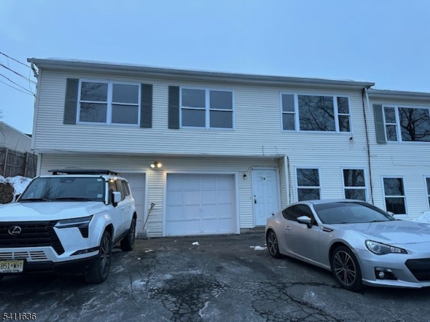 Recently updated and ready for quick occupancy. This home features an oversized 2-car garage, central air conditioning, a nice yard, and a prime location within walking distance of downtown.