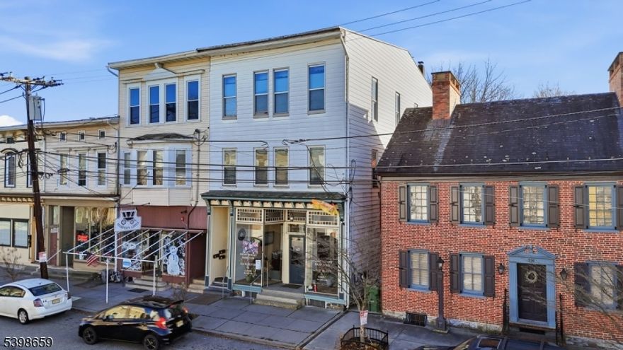 Exceptional mixed-use investment opportunity in the heart of historic Belvidere! This well-maintained 4-unit commercial building blends strong income potential w/ major updates throughout. The property features one commercial unit plus three beautifully updated residential apartments, each offering modern finishes, bright living spaces, & long-term tenants who appreciate the building's condition & location. Improvements include newer wiring & plumbing, a furnace approximately 8 years old, & a hot water heater installed just 1 year ago. Additional upgrades such as thermopane replacement windows, updated kitchens & bathrooms, and a completed State inspection provides peace of mind & reduce future maintenance costs. The property also includes solar panels that help offset electric expenses, as well as a full basement offering storage & utility access. Located in charming Belvidere, known for its Victorian architecture, small-town character, & convenient access to Route 46, Route 80, & nearby Pennsylvania, this property stands in a growing rental market w/ steady demand. Belvidere's walkable town center, riverside outdoor activities, and historic district continue to attract residents and small businesses alike. Whether you're expanding your portfolio or seeking a stable, turnkey asset, this mixed-use property offers excellent long-term value, strong tenant retention, & minimal deferred maintenance, an outstanding investment in one of Warren County's most picturesque communities