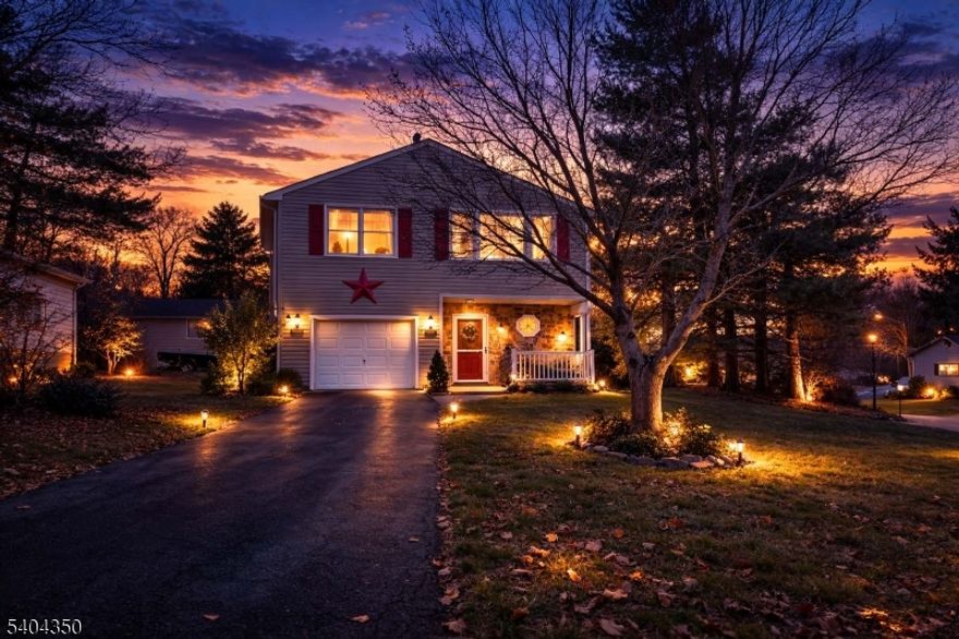 This house is everything you've been waiting for is right here. Located on a quiet cul-de-sac, this fully modernized home offers the perfect blend of privacy and commuter comfort. Just minutes from shopping, dining, and vibrant downtown Easton, PA, the site offers quick access to local transit; route 22, and I-78, making commuting to nearby New Jersey hubs or New York easy. Approximate commute times are Easton, PA (10 minutes), Phillipsburg, NJ (5 minutes), and NYC (about 1 hour and 15 minutes).  Inside, the home has hardwood floors, a brand new kitchen with stainless steel appliances, and three fully updated bathrooms. The flexible ground-floor plan is ideal for alternative living spaces or home office needs, complete with a full bath, an energy-efficient pellet stove, and walk-in access to the garden. Spacious bedrooms include a primary suite with an en-suite bathroom.  With neutral decor, updated fixtures throughout, and a location designed for easy daily traffic, this home offers comfort, efficiency, and accessibility in a unique package. As an added bonus, the property comes with a home warranty that covers plumbing, electrical systems, appliances, and heating and cooling systems, providing the next owner with additional peace of mind.