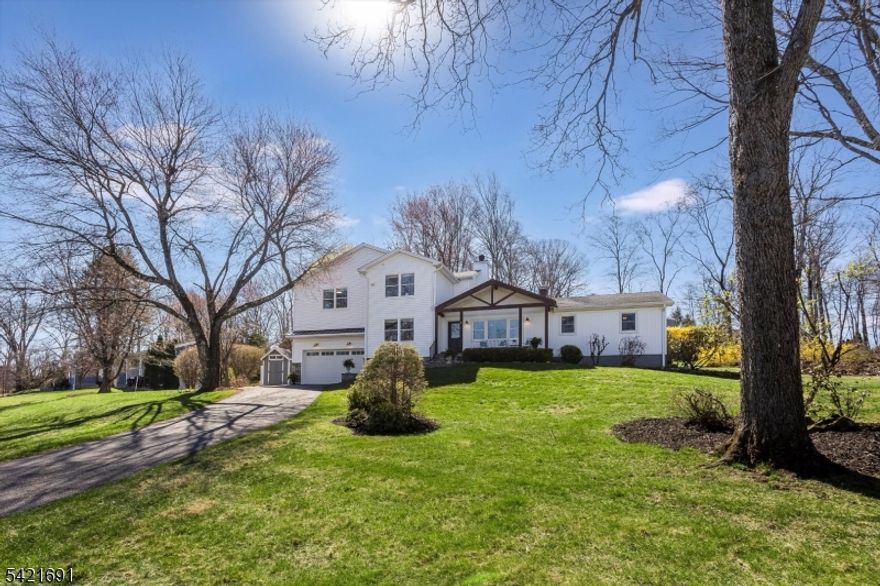 Thoughtfully rebuilt from the inside out, this walk-to-town Chester Borough home offers the kind of substance & style buyers rarely find-- all on a cul-de-sac street. The initial 2014 work included a full interior renovation with new electrical, plumbing, windows, kitchen, full bath, and a completely redesigned primary bath and bedroom on the first floor w/ adjacent office (with closet).  A major 2019 expansion added a 2-car garage,  spacious family room, second level with 2 bedrooms and an extra room and a full hall bath, along with new siding, roof, furnace, paver patio, and updated windows and doors creating a home that lives like a modern build while retaining Borough charm. The home now offers 3 bedrooms plus a 1st fl office and flexible 2nd fl extra room, 3 full baths, wood floors, tile baths, cozy fireplace, & bright white kitchen with granite and stainless appliances. Upstairs, a generous space sits between the bedrooms ideal for a lounge, play area, homework/work zone.  Additional features include a half-finished basement with ample storage, fenced yard, outdoor shed, & newer water heater & well pump. With approximately 3,000 SF of finished living space and the rare ability to stroll to Chester's shops, cafes, & events, this is a home that truly stands apart.  Highly rated Chester & West Morris schools w/ IB program. IMPORTANT!  This is NOT the Valley View off of Old Mill Rd.  Use Waze: 4 Valleyview Rd.  Pleasant Hill Rd to Valleyview.  On the corner of Orchard Ln.