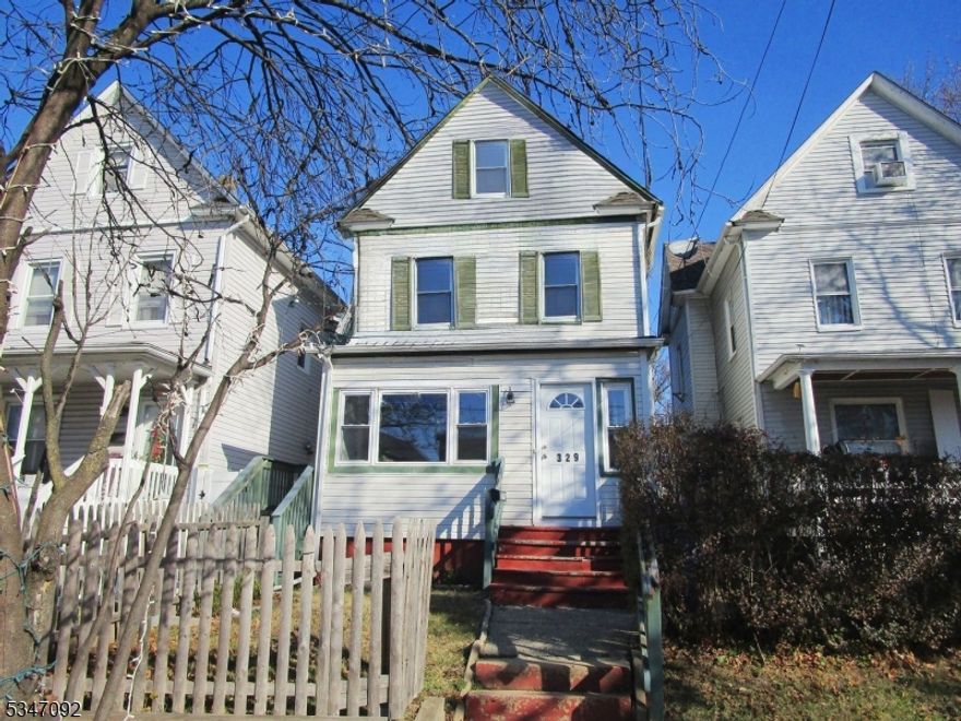 Move-in ready! Low taxes! Colonial style home with a deep yard.  Located only 0.5 miles from Netherwood Station on the Raritan Valley Line.  Sold as-is.