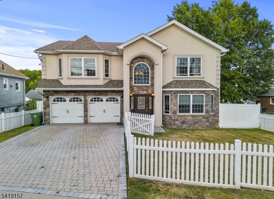 Welcome to 431 Raritan Rd, a beautifully crafted Colonial home built in 2013, ideally located in Linden's desirable Sunnyside neighborhood. This well-kept property features 4 generously sized bedrooms and 2.5 bathrooms, offering a perfect mix of classic style and modern living. As you enter, you're greeted by a bright and inviting layout centered around a spacious kitchen complete with custom cabinetry, granite countertops, and a large center island ideal for both everyday use and entertaining. The open flow continues into expansive living and dining areas filled with natural light. Upstairs, the primary suite serves as a true retreat, showcasing a tray ceiling, two walk-in closets, and a spa-like en-suite bathroom with a Jacuzzi tub and double vanity. Additional features include central heating and air conditioning for year-round comfort, a cozy fireplace, and a two-car attached garage. Situated on approximately 0.20 acres, the property also offers ample outdoor space for relaxing or hosting. Conveniently located near major highways, public transportation, shopping, and dining, this home offers easy access for commuters while maintaining a peaceful suburban setting. Don't miss your chance to own this exceptional home!