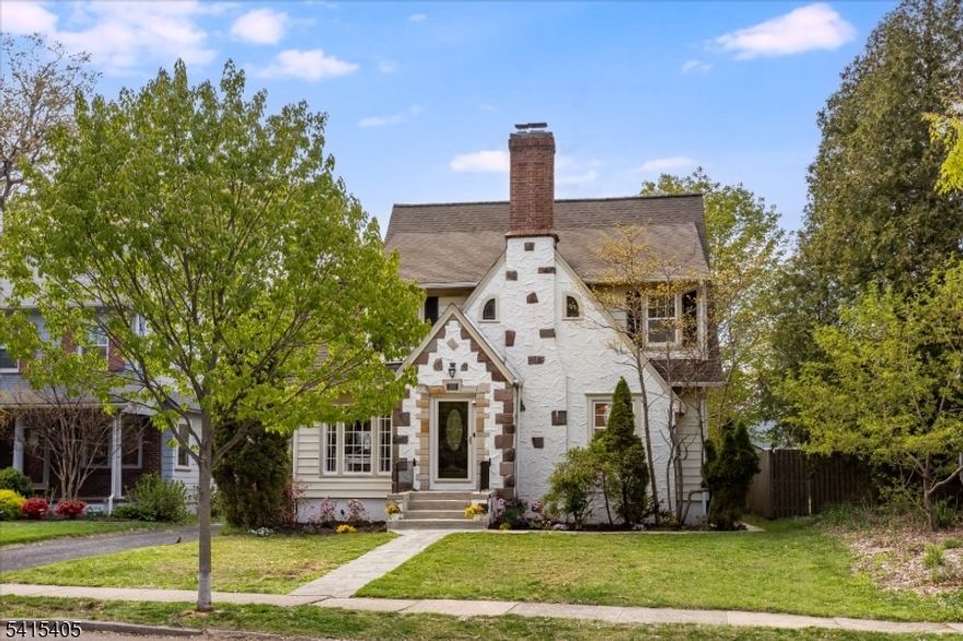 Set on one of South Orange's most beloved streets, this bright and welcoming four-bedroom, two-and-a-half-bath home is filled with natural light, generous space, and the ideal flow. Sunlight pours through oversized windows and soft archways, creating a home that feels open and airy with plenty of room to spread out and live. The eat-in kitchen is bright and inviting perfect for everyday meals, morning coffee, and time spent together. The living and dining spaces highlight the unique architecture and offer a wonderful sense of openness, making it easy to gather, relax, and entertain. All of the bedrooms are generously sized, including a spacious primary ensuite with its own full bath. The third-floor offers great flexibility for guests, a home office, or a quiet retreat, while the finished basement adds even more space for a playroom, media room, or hangout area. Step outside and you'll find one of the home's most special features: a truly expansive backyard. Whether it's entertaining on the deck, letting little ones run freely, or simply enjoying a quiet morning, this outdoor space is something rare and special. Located just 0.6 miles from the NYC Direct train and vibrant downtown South Orange, with its restaurants, cafes, and movie theater, and close to parks, library, and town pool. A wonderful opportunity to enjoy space, community, and an easy NYC commute all in this picture-perfect neighborhood!