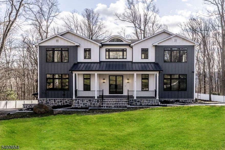 This completely rebuilt custom colonial offers an unparalleled combination of modern sophistication and timeless design. This home combines the serenity of a mountain retreat with  the high end finishes of a NYC penthouse. A double-height entry hall welcomes guests with striking double glass and steel front doors The residence is framed by a sweeping circular drive 3 car garage and professional landscaping  Reconstructed from the ground up, the home features expansive living spaces. Every bedroom in this home includes its own en-suite bath for total comfort and privacy A designer kitchen featuring a large center island with high-end cabinetry. The kitchen is equipped for the serious chef with premium stainless steel appliances, stone countertops and access to back/butlers pantry. The primary suite is a wing unto itself with 2 primary walk in closets and an expansive bathroom retreat with multi head rain shower and heated floors. This home also boasts multiple decks for sunset views and indoor and outdoor living. Not to be missed is the lower level with gym, recreation room with wet bar, and ensuite bedroom with direct access to the covered patio and  backyard. Watchung offers a top tier school system  Minutes from major highways like routes 78 or 22 and convenient to shopping and transportation to NYC. Watchung has a "mountain town" feel with only being 30 minutes from NYC.