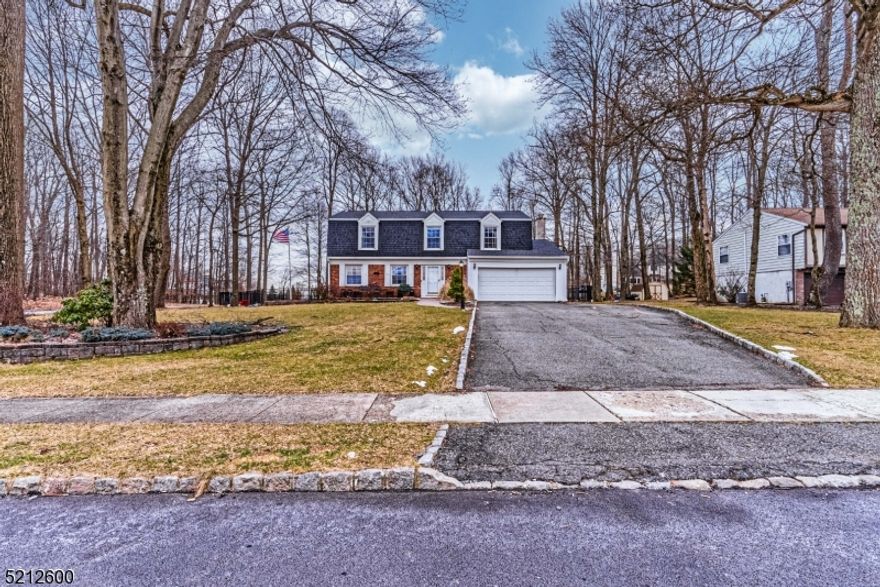 Welcome Home! Charming Colonial on .65 acres of beautifully landscaped level, corner lot in the Coveted Camelot Estate Section of Budd Lake. Move right in, just in time for summer- STUNNING in-ground pool! Pride of ownership shines! Immaculate & carefully thought through & cared for by the same owners for 30 years. Lots of Generous Room Sizes to Spread Out & Make Your Own! This 2,000 sq ft Home has a Comfortable, Spacious Floor Plan. Many Appealing Features Throughout. Granite Counters, tile backsplash, low maintenance laminate flooring, double insulated vinyl windows & newer mechanicals! Just to name a few! Full feature list can be provided. First floor offers your classic & highly functional layout. Formal living room & dining. The eat-in kitchen overlooks the backyard & family room with a WB fireplace. Powder room & coat closet off foyer. Upstairs, 5 generous sized bdrms & 2 full baths including the primary suite.Tons of bonus space in the full bsmt! Rec room area, laundry, workshop & plenty of storage! 2 Sheds & a 2 Car Garage if more needed! Backyard OASIS - Perfect for Entertaining & Relaxation! Enjoy the 20x40 nat gas heated pool or lounge on the 2 level paver patio (w/hookup for hot tub). Fully fenced in! In-ground sprinkler system. Like we mentioned before  get in just in time to enjoy your new home & yard for summer!! Make this your STAYCATION. Great home, lot & condition with great school system only minutes to Rts. 80, 46, 206, 10, trains, shopping & Lake Life.