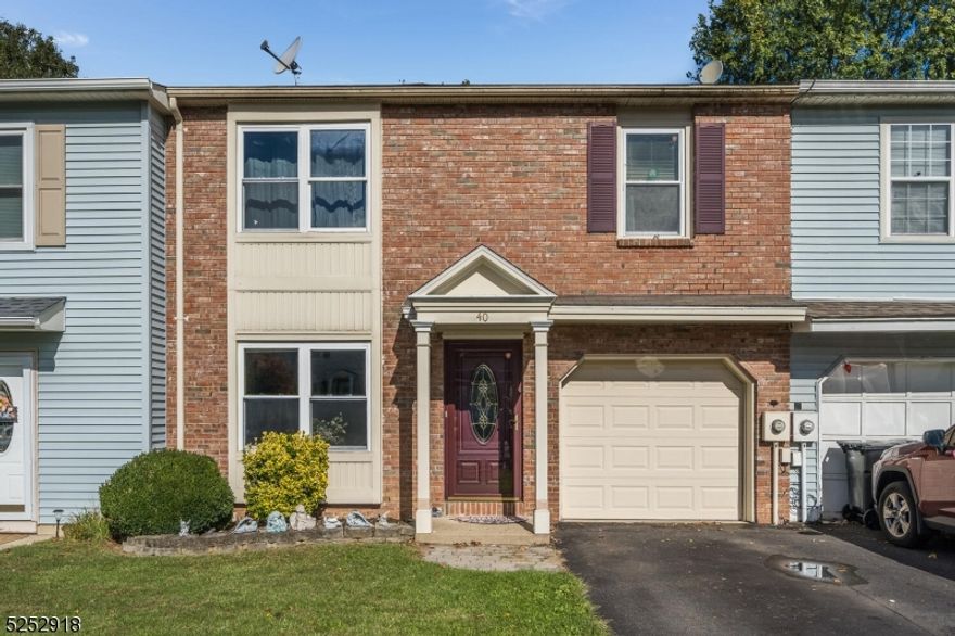 Great starter home...3 bedroom and 1 1/2 bath town home in Schabecong Village this unique community has NO Association  so no monthly fees! Large light and bright Living room with bay window, Dining room with slider out to covered deck for all weather entertaining with fully fenced-in backyard. Upper level offers 3 large bedrooms, full bath, and oversized laundry room. Minutes to downtown, shopping areas including, gym, yoga studio, golf course, Meadow Breeze Park, restaurants and major roadways.