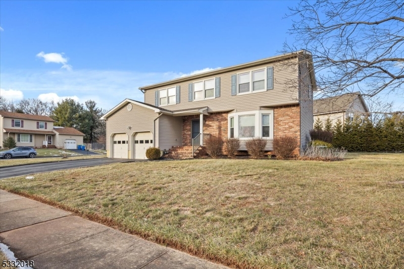 This Four-Bedroom Colonial is situated on a desirable corner lot, on a culdesac street and in an established neighborhood with sidewalks. The eat-in Country Kitchen features a breakfast bar and access to a back Deck, perfect for outdoor dining and entertaining. There are 2.5 updated Bathrooms, ensuring modern convenience and style. The Main Floor includes a Dining Room, Living Room with a Bay Window, and a cozy Family Room. A Laundry Room on the Main Floor adds practicality. The Basement is spacious, clean, and ready for finishing, offering additional potential living space. With plenty of storage options throughout, this property combines practical living spaces with a desirable location, making it an ideal home.