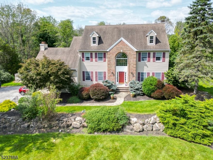 Introducing this Impressive and Spacious center hall colonial that is set back from the road. Located in prestigious Stone Meadows Estates in highly desirable Green Twp. Perfect for those seeking plenty of space and versatile living options. Boasting over 3000 square feet! As you pull up to the property, you'll be immediately struck by the beautiful curb appeal! Enter through the 2-story foyer that welcomes you into this lovely home, where beautiful memories are sure to be made!! Some notable features include a fireplace in the Family Room, and fireplace in the Great Room. Cathedral ceilings, large deck, partially finished walk out basement,  jacuzzi in master bathroom, Commercial grade systems! (HVAC, Whole house Generator) And last but not least, a peaceful outdoor oasis with geothermal heated in- ground swimming pool! Close to commuter routes, dining, shopping, and recreation. You will love this home!!