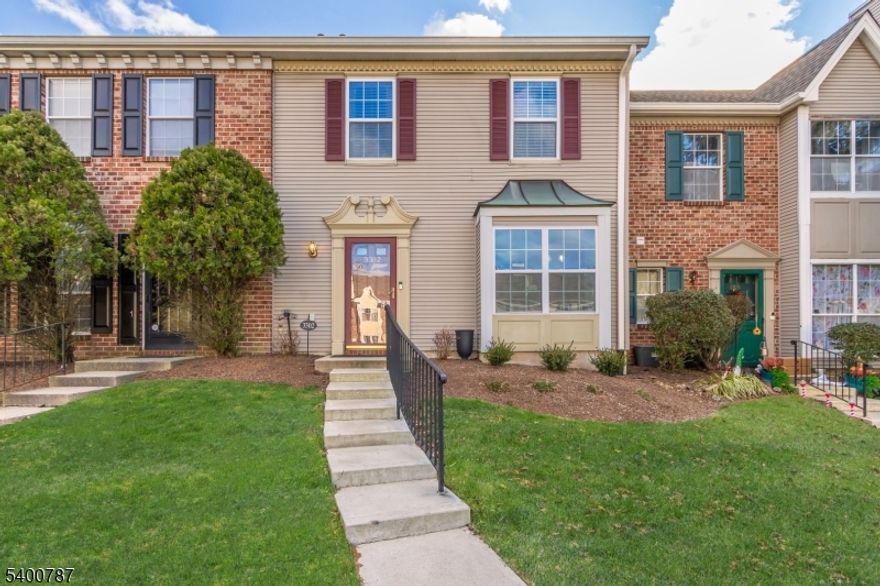 Welcome home to this beautifully maintained and spacious three-bedroom, two-and-a-half-bath townhouse in desirable Vanderhaven Farms. This is the largest model available and includes an expanded sunroom for extra living space. The updated eat-in kitchen features white maple cabinetry, granite countertops, and stainless steel appliances. Rich hardwood flooring flows through the formal dining room and into the bright, open living room, where a wood-burning fireplace and brick accent wall create a warm focal point. The sunroom extends seamlessly from the living area, filled with natural light and offering direct access to the newer concrete patio and private grassy backyard an ideal spot to relax or entertain. Upstairs you'll find three generously sized bedrooms, all with hardwood flooring, including a primary suite with ample closet space and a fully renovated ensuite bath. The updated main bath features beautiful marble tile flooring, and the second-floor laundry adds everyday convenience. Enjoy community amenities and a fantastic location close to highways, schools, dining, shopping, NYC transit, and all Bridgewater conveniences. New roof in 2019 (no assessment). Recent updates include A/C 2025, water heater 2024, Bosh Dishwasher 2025. Move right in and enjoy the comfort and style this home has to offer. Highest and Best due Wednesday 12/17 at 5pm.