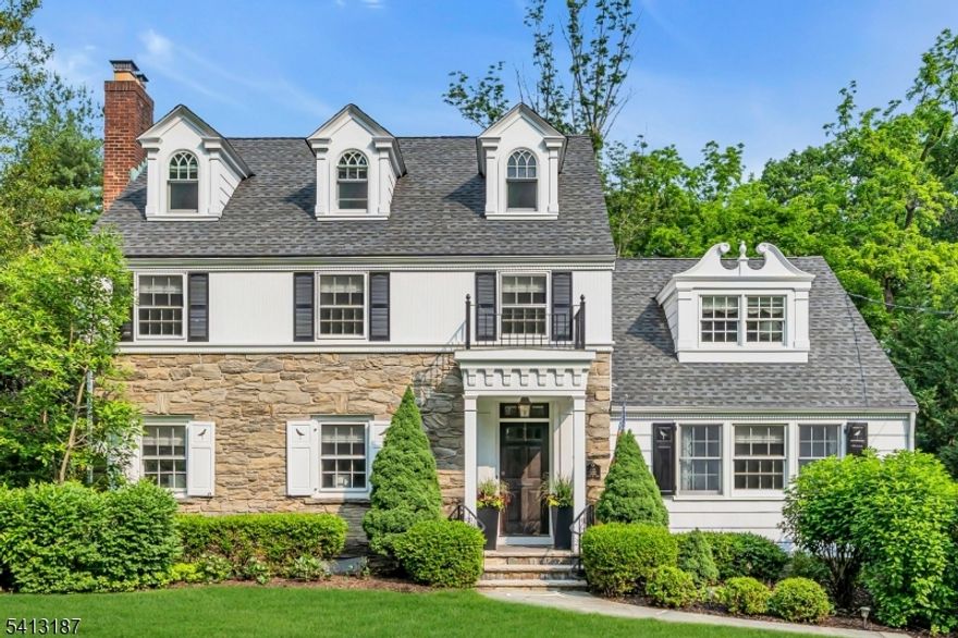 Rare offering on sought-after UPPER WASHINGTON AVE! This classic 6BR 5.1BATH Center Hall Colonial was thoughtfully RENOVATED AND EXPANDED in 2012, blending timeless elegance with modern luxury across FOUR finished levels. Privately set on a level HALF ACRE, the home offers exceptional indoor-outdoor living. The heart of the home is the gourmet Kitchen featuring a large center island, custom white cabinetry, marble countertops and high end appliances including a Viking 6-burner cooktop with griddle. The Kitchen opens seamlessly to the sun-filled Family Rm with stone fireplace, coffered ceiling, built-ins and dramatic 4-panel glass doors overlooking the idyllic backyard. The Formal Dr with Butler's Pantry is ideal for entertaining. The Primary Suite is a serene retreat with a marble-surround fireplace, vaulted ceiling, private Balcony, spa-like Bath and 2 Walk-In Closets. In-Law/Nanny Suite with full BA and Kitchenette is perfect for extended guests. Enjoy outdoor entertaining on the Trex deck featuring a built-in stone fireplace or relax on the patio around the fire-pit with built-in seating. Lower level offers a Recreation Rm with fireplace, a Game Rm, and a versatile room ideal for a Gym or a Media Rm. Additional highlights: private, first floor Office, 4 fireplaces, expansive Mudroom, walk-in Pantry, ceiling speakers, intercom system and a whole house generator. WALK TO EVERYTHING: top-rated Chatham schools, NYC direct train, and charming downtown. Your dream home awaits!