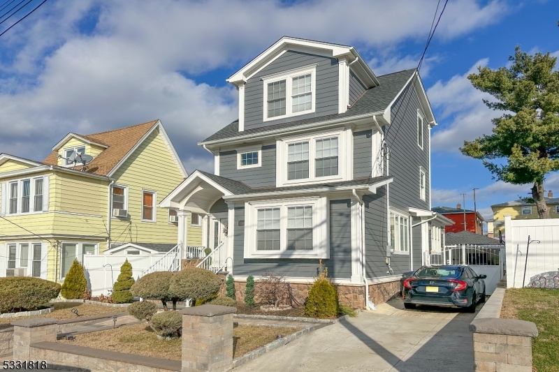 This newly constructed over existing foundation colonial style with three beds. and three and one half bathroom. The main level features spacious rooms including the entry foyer, living room, a sitting room, one half baths, the modern kitchen with a center island, formal dining room that connect through a sliding glass door to the patio. Second floor, features a loft, balcony and a master bedroom with full bathroom and a very spacious walking closing. Third floor also has a loft, 1 full bathroom and two bedrooms.  The walkout finished basement houses features a family room or ample space for an extra guest room. full bathroom, storage room, and a convenient laundry setup with a washer and dryer. and utilities. Outside, The backyard features a magazine-worthy rectangular gas - heated in-ground swimming pool and a spacious paver patio with built in Kitchen and built-in BBQs ideal for entertaining or enjoying outdoor moments. Attached over-sized 2-car garage, storage Shed and driveway. fenced backyard. Gleaming hardwood floor thought and detached 2 car garage with long driveway that can accommodate 4 or more cars.