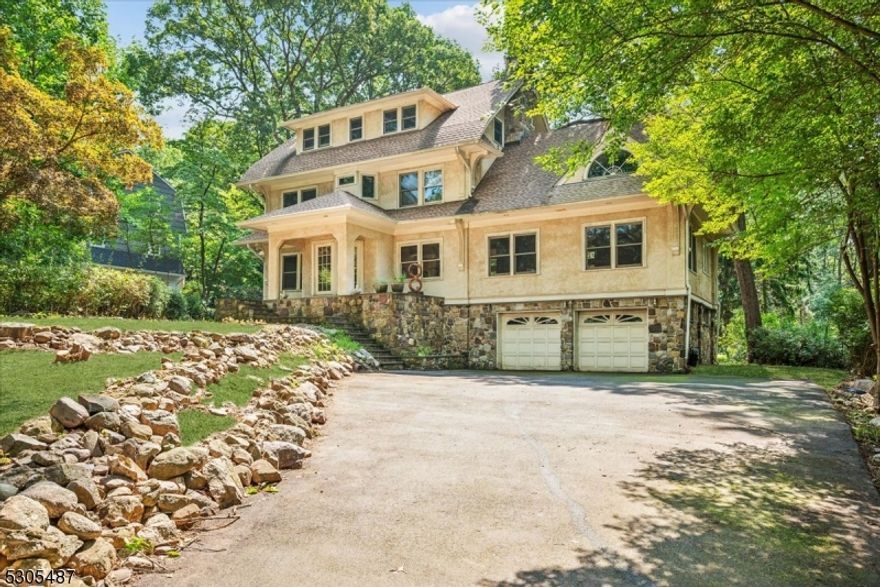 Exquisite Opportunity in aPremier Neighborhood! Old world charm abounds in this gracious 1920 Colonial Hopgoodhome with over 3,700 sqf  of space offering 6 bed/4 baths. Set on just over half an acre on a tree-lined st in the pristine community of Mountain Lakes, this is the perfect opportunity to bring this stately home back to its original luster. Stone front entry and portico bring you inside to an airy main level highlighted by inlaid hardwood floors and vaulted and coffered ceilings. The spacious living room has elegant columns and a wood-burning dual-sided fireplace shared with the formal dining room. Large kitchen with abundant cabinetry, center island with cooktop and large adjoining breakfast area. 2 bedroom on this level are perfect for guests or an office with one boasting its own balcony, both serviced by a full bath.Upstairs hosts a primary suite, en-suite bath with separate tub and shower, and an airy loft space with fireplace. A 2nd bedroom and full bath w/tub complete this level, while the 3rd floor has 2 more big beds and a Jack-n-Jill bath. Lower level provides ample storage, laundry, workshop, and access to the oversized attached 2-car garage.Two sets of French doors lead to a sprawling outdoor oasis with a large deck and side and back yards surrounded by mature greenery creating an ideal setting for everyday enjoyment. Enjoy the wonderful location near stores, restaurants, top rated schools, lakes, parks, and trails, plus NJ Transit right down the road.