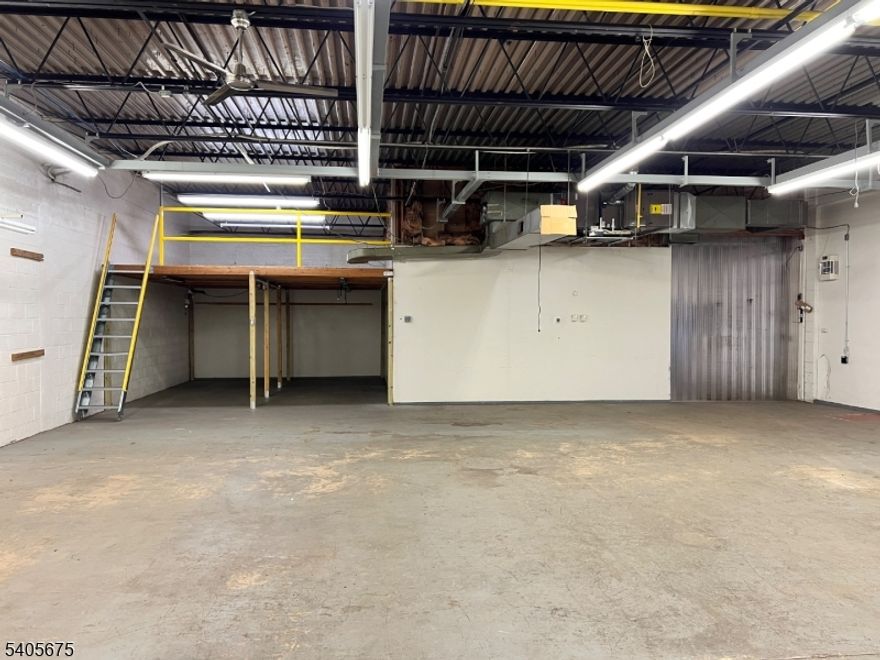 Versatile 4,200 SF (approx.) Flex Unit offering a functional blend of warehouse and office/showroom space. The property features approximately 2,200 SF of warehouse area with a 10? clear drive-in door, plus the potential to open an additional (approx.) 500 SF for expanded storage or operations. Equipped with 208V 3-phase power and multiple 120V sub-panels, the space supports a wide range of commercial and light industrial uses. The building includes central air and heating throughout both warehouse and office areas, a kitchenette, two private bathrooms, an open showroom or conference area, and one private office, making it ideal for tenants seeking flexible, well-appointed space.