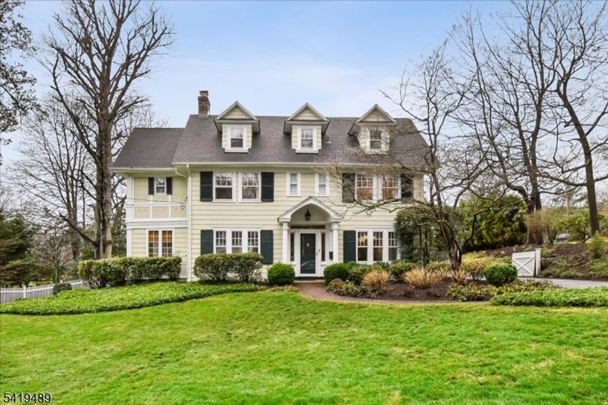 Resting on nearly half an acre of land, this center hall colonial home enjoys a beautiful and quiet setting in the highly sought-after Glenwood section of Short Hills.This gracious home features 9 feet ceiling high, wonderful curb appeal, spacious rooms and architectural detail extraordinaire! Enter to a perfect center all colonial with formal dining room on the right and a front to back living room to the left. The LR has a central fireplace with French doors on either side which open to the family room. An up to date sun filled kitchen with top of the line appliances and separate breakfast area complete the floorThe second level features a stunning primary suite complete with a dressing room and a luxurious bath appointed with elegant Rohl fixtures. Two additional bedrooms, each with their own baths, complete this level. The third floor offers a versatile office space along with a fourth bedroom and full bath, ideal for guests or a private retreat.The finished lower level provides additional living space, including a recreation room, exercise area, and powder room, all enhanced by updated finishes. Outdoors, the landscaped, fenced yard is a private oasis featuring a bluestone terrace " perfect for relaxing or entertaining. A two-car garage completes this exceptional offering, conveniently located near top-rated schools, the NYC train, and the charming shops and dining of Short Hills Village.