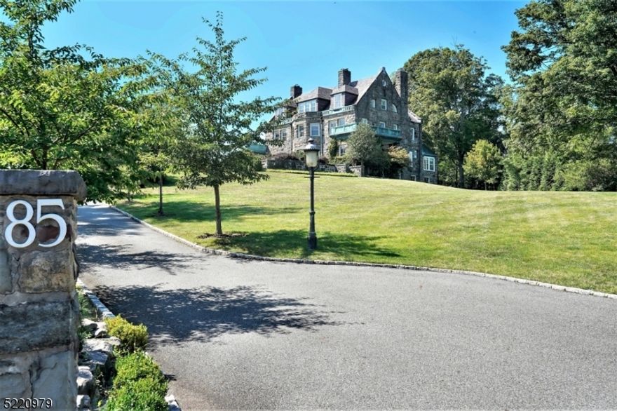 Fresh and bright, this spectacular estate offers it all with a major expansion that added a new family room, primary bedroom suite and exercise room across three levels. The stone mansion, appropriately named "Appin", is a residence of historic significance built by John Stewart Jr., perched up high and overlooking one of the most prestigious streets in Old Short Hills. Sports enthusiasts will enjoy one of only a few residential indoor squash courts in the US as well as outdoor tennis, basketball, swimming and plenty of room for football and soccer. The 2.3 acre property is framed by sprawling lush flat lawns, stone terraces, a 4-car over-sized garage and pool house with kitchen, full bath and laundry. The impressive formal rooms have recently been refreshed, offering lofty ceilings, striking millwork and a soaring staircase. More informal but no less impressive is the chef's kitchen boasting a La Cornue dual-fuel range and other professional appliances, opening to the new sun-filled family room with spectacular views of the expansive rear property. The new primary suite also offers an abundance of windows and light as well as impressive closet storage while the lower level is a welcomed surprise, offering an assortment of rooms created for the individual tastes of its occupants including a billiard/ping pong room, media room, wine tasting room, recreation room, sunken exercise room and powder room. Bespoke living at its best.