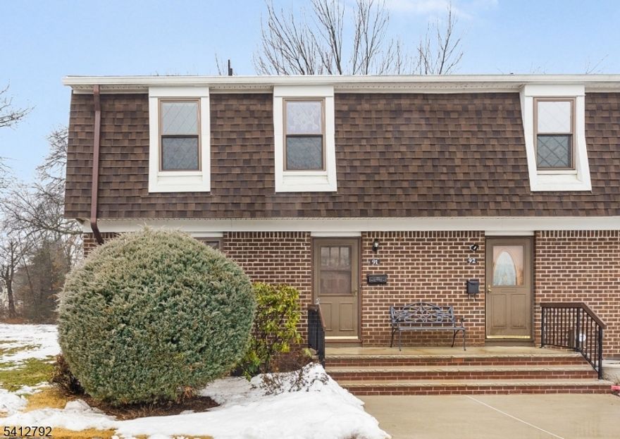 Welcome to 91 Devonshire Court, located on a cul-de-sac in the highly sought-after Tudor Village neighborhood of Hillsborough Township. This end unit townhouse features 2 bedrooms, 1 full bath, and 2 half baths. Beautiful hardwood floors flow throughout the entire home, from the main living areas to the bedrooms, adding warmth and a timeless quality finish to every room. Intricate wainscoting and quality craftsmanship can be seen throughout the home. The eat-in kitchen offers comfortable everyday dining. Enjoy two private decks   one on the upper level and one on the lower level   perfect for outdoor relaxation and entertaining. Built-in storage is featured throughout the entire home, keeping every space neat and organized. The spacious finished basement provides excellent multi-purpose living space ideal for a home office, media room, or gym. An additional unfinished area in the basement is perfect for laundry and extra storage. Additional highlights include forced hot air heat, central A/C, public water and sewer, and assigned parking. Opportunities in Tudor Village don't last long   this is a MUST SEE!