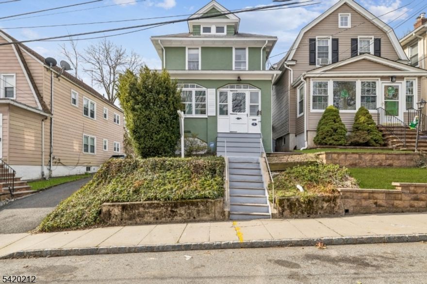 Lovely 3-bedroom, sun porch, hardwd floors thru-out, formal dining room, living room and EIK. Close proximity to NYC transportation and Major Hwys...