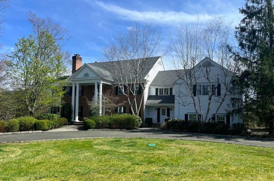 Tremendous value for this beautiful colonial situated on a quiet cul-de-sac on over three private and serene acres with preserved open space views in Harding's  "Eastern Side" of New Vernon. The home is minutes to downtown Morristown, Madison and Chatham. There are three full floors of living space with five bedrooms on the second floor and six full and two half baths in total. The first floor offers a wonderful mix of formal and more casual living.  The formal portion offers a large foyer, a dining room and a living room with a fireplace, as well as a gorgeous mahogany paneled library with a fireplace.  The large eat in kitchen opens to a family room with a fireplace and loads of light streaming through large windows and French doors offering backyard views from a large deck.  There is a front side entry with a mudroom area, garage entry first floor laundry and back stairs. The second floor has a large primary suite with a fireplace in the bedroom, a sitting room, his and her closets as well as dressing and make-up area leading to the bath. There are Four additional bedrooms, all with generous size closets, two with ensuite baths and one Jack and Jill bath.  There is a walk out lower level with 2 full baths, a cedar closet, a bedroom and recreation space. Many recent updates include a just completed pool renovation, new roof, new hot water heaters, 2 new / replaced furnaces, interior paint and much more. A must see home.