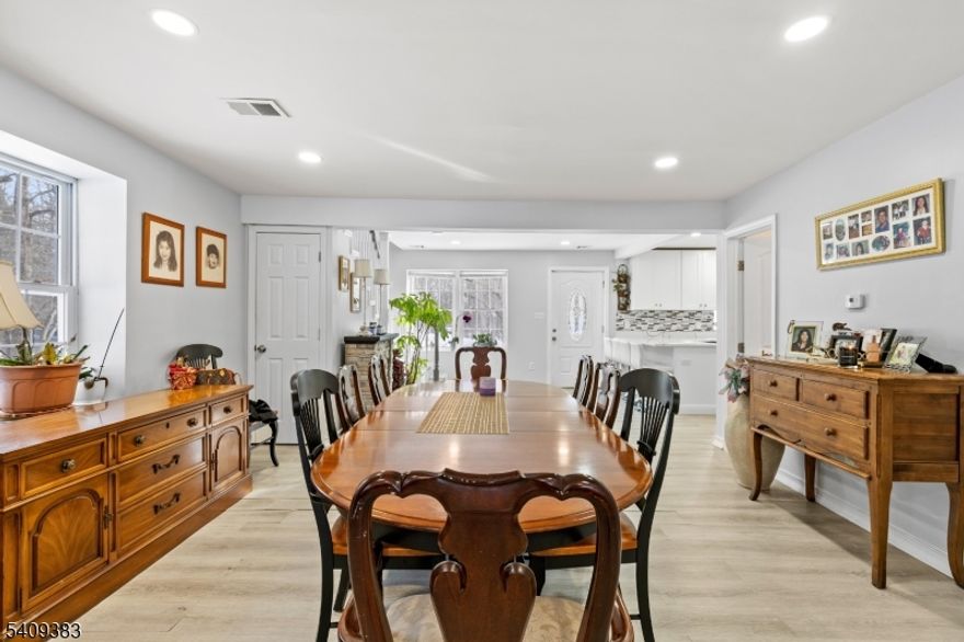 WELCOME HOME excited to introduce 130 Flocktown Rd! A once in a lifetime opportunity to own a fully renovated multi residence retreat tucked into the woods. A rare unique, three structure compound set on 1.5 private acres with no rear neighbors and nothing but "forest  behind you. Main house features (fully renovated 2023): Private primary bedroom with a spalike en-suite + updated kitchen anchors the home ft breakfast bar. The layout moves effortlessly into your dining area & expansive living room with sliders that draw you outside to your private lot. Additional mud & laundry room add every day functionality. Cottage house features: Updated two bedroom with fully equipped kitchen and bathroom + soaring exposed beams elevate your living room. 2 homes & 2 car detached garage are all approved structures on the lot.