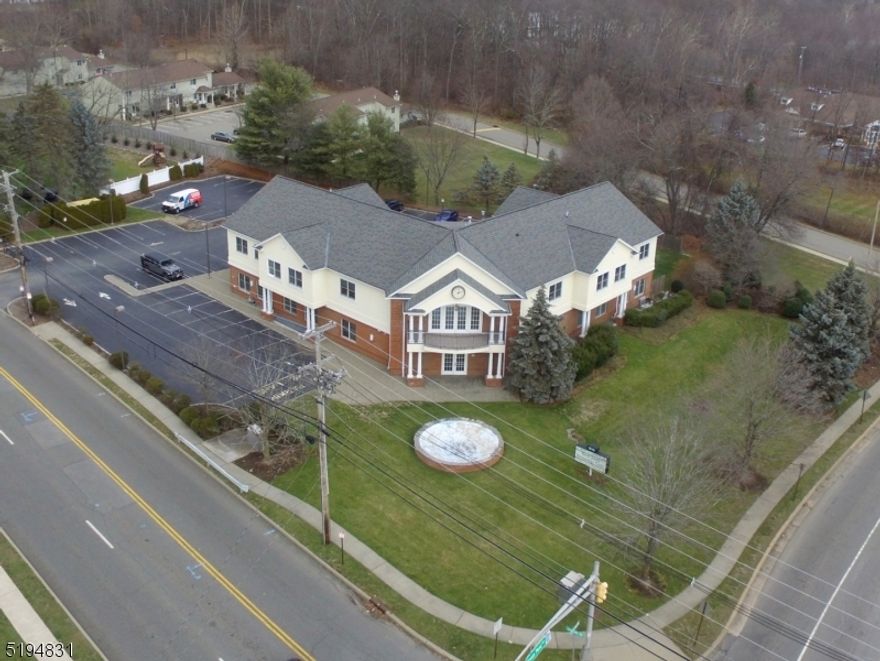 SPACIOUS 12,000+ SQUARE FOOT COMMERCIAL BUILDING WITH AN ADDITIONAL FINISHED BASEMENT WITH HIGH VISIBILITY.  THIS BUILDING IS IN EXCEPTIONAL CONDITION AND HAS PARKING FOR ABOUT 40 VEHICLES. A MUST SEE!