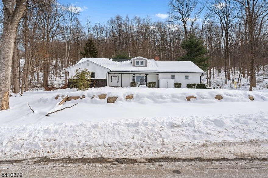 Welcome to the Cape Cod that checks every box offering space where it matters most and upgrades that truly set it apart.This turn key 4-bedroom, 3.5-bath home features an exceptional layout with 4 generously sized bedrooms including two upstairs suites, each with their own private en-suite baths and generous closet space. Thoughtfully updated from top to bottom, the home offers a NEW roof, siding, windows, furnace, central air system, and water heater all upgraded in 2025. Inside, hardwood flooring runs throughout, while the kitchen and all bathrooms have been beautifully redesigned in 2025 with modern finishes and timeless appeal.  A two-car garage and full basement offer additional space for storage, recreation, or future finishing potential adding even more versatility to an already impressive home. Nestled on a private wooded lot, this home offers a serene setting just moments from Mountain Creek Ski Resort and year-round recreation.Completely turn-key, impeccably updated, and ideally located this Vernon property is where lifestyle and luxury meet. .Multiple Offers Received , all offers due by Wednesday 2/18 at 3:00pm.  Thank you.