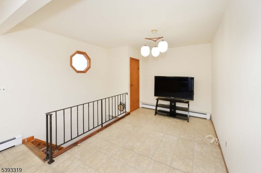 THIS SECOND FLOOR 1 BEDROOM, OFFERS A FRESHLY PAINTED, CLEAN AND SUNNY  APARTMENT. THE BEDROOM AND LIVING ROOMS ARE CARPETED,OPEN AND SPACIOUS KITCHEN AEREA., RENOVATED BATHROOM, CLOSE TO SHOPPING, RESTAURANTS, PARKS, NJ TRANSIT STATION, AND HIGH WAYS.CLOSE TO SCHOOLS, HOUSES OF WORSHIP, REQUIREMENTS INCLUDE A CREDIT REPORT WITH NTN, INTERVIEW, PROOF OF EMPLOYEMENT.NO PETS, NO SMOKING,