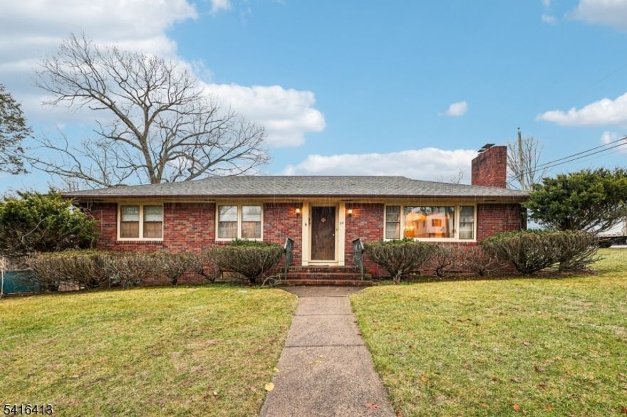 Brick Ranch on a corner lot featuring Living room with fireplace, Formal Dining room, Eat-in kitchen, three Bedrooms, Enclosed porch and Full Bath. The ground level offers garage access and includes an Office, Rec room, summer Kitchen, Full Bath, and Laundry room, providing flexible living space. Two-car built-in garage. Conveniently located approximately 30 minutes from NYC and close to parks, transportation, schools, dining, and shopping. Home is being sold in as-is condition.