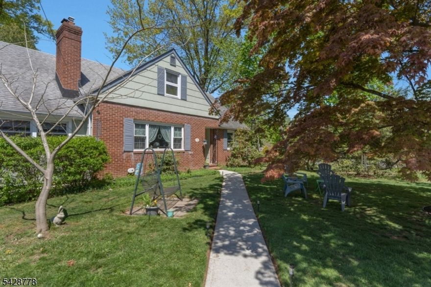 This surprisingly spacious, expansive home has so much versatility and flexible living areas you will not lack space for entertaining, gatherings or accommodating overnight guests.  The newly renovated kitchen showcases a 5 burner stove, quartz countertops, soft close custom cabinets, subway tile backsplash and is centrally located in the home. Expansive living room offers, brick wood burning fire place, with custom built INS and huge scenic picture window with natural wood trim through out. All new LVP flooring on he first floor, a family rm that could potentially be a 6th bedroom or au pair suite with full bath and laundry rm, private entrance and access to a  huge deck that leads to an enormous fenced in backyard.  Head upstairs to a whole other world with a 2nd Kitchen area (stove to be removed and capped) 3 more bedrooms and a full living room. A 3 season room that overlooks the yard and town park right next door.  Brand new furnace and Hotwater heater less than a year old that gives you peace of mind for years to come. Within blocks of the train, schools, shopping and major highways, yet tucked away in a neighborhood that gives you the small town experience.  Abundant storage is a staple in this house with plenty of closets and a full basement that is a blank canvas. Meticulously cared for and move in ready. This is an exceptional property. Come in and take a private tour, you won't want to leave.