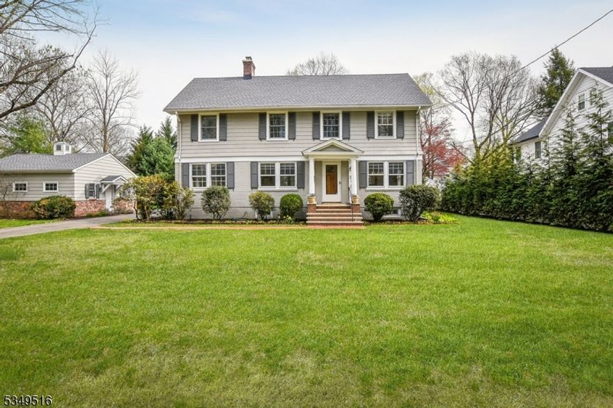 Location, Location! Spacious center hall colonial just blocks to town, train, schools and parks.  Recently renovated with new roof and primary bath,  this home offers a great floorplan, high ceilings, home office, open concept kitchen and family room.  Fabulous .49 acre private level yard. The one you have been waiting for!  Chimneys, fireplace, and windows in as is condition.