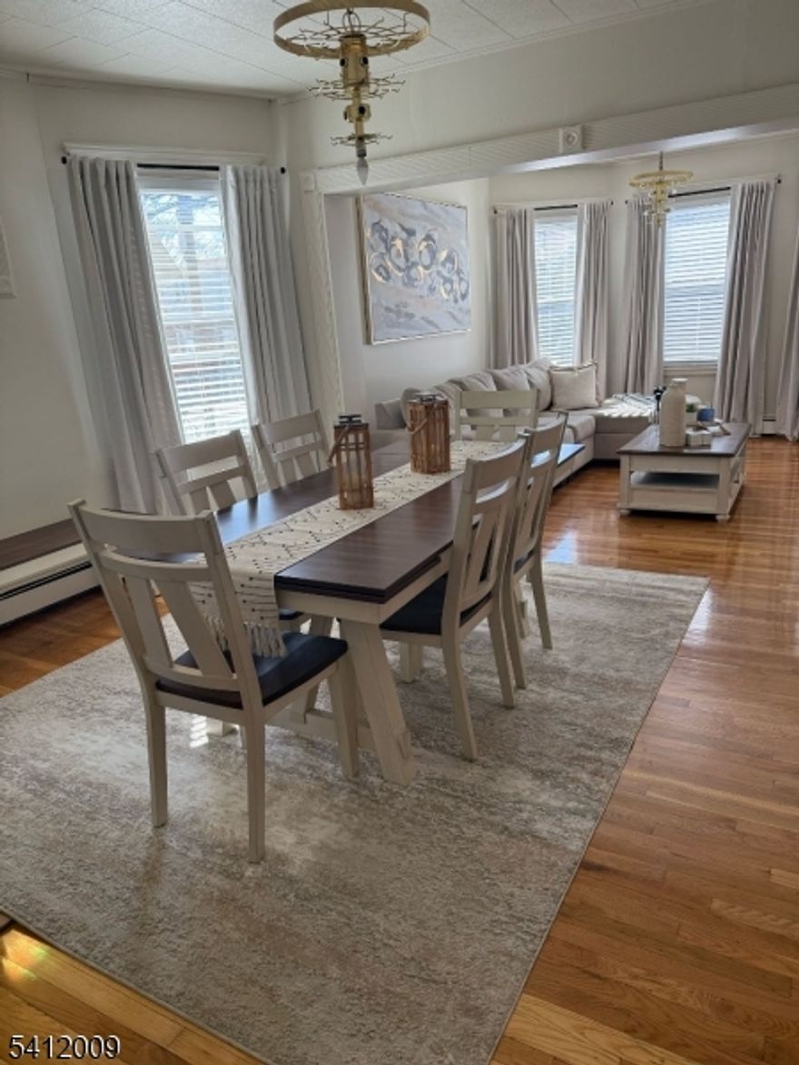 Nice and renovated income producing 2 family house located in a great section of Paterson. First and Second floor units offers 3 bedrooms and 1 bathroom, Living room , formal dining room ,eat in kitchen. Finished basement with full bath , finished attic with full bath. Features Hardwood floors , porch , wood deck. Home sold As is .