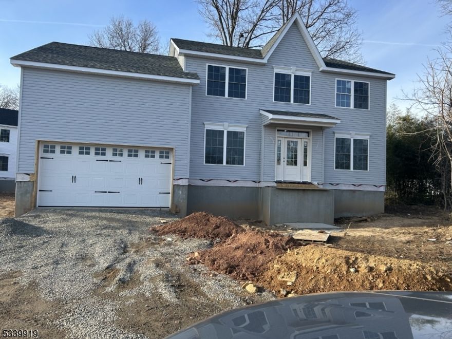 Under construction.  4 Bedrooms on 2nd Floor & 1 Bedroom on the 1st Floor with full bath. 3 full bathrooms total; Custom trim package; Kitchen with Quarts countertops; private main bedroom with 2 walk-in closets and spacious bedroom with tub, shower and water closet.  Gas fireplace in family room open to kitchen; 2 car garage w/garage door openers; 2nd floor laundry; Culture stone per plan; Common driveway; Great generational house. See house plans for room dimensions.