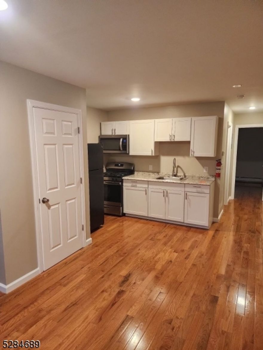 Nice Updated 1 Bedroom Apartment!!! Ground Floor, Hardwood Floors & Much More!!! Must See! Convenient Location For The Everyday Commuter! Great Rental!!! Open Floor Plan     Option for NO SECURITY Deposit Option   unit A
