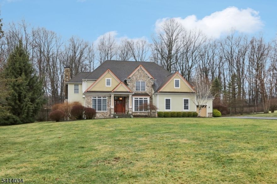 Welcome to this exceptional estate set on a private 2.47-acre, cul-de-sac road, in highly sought-after Chester. Offering approximately 4,900 square feet across the first and second floors, this elegant residence combines timeless design with modern comfort and exceptional entertaining spaces.The main level showcases a beautifully appointed kitchen with two walk-in pantries, formal dining and living rooms, an inviting family room, powder room, full bath, and a spectacular sunroom with a soaring cathedral ceiling and walls of natural light, opening to a newly installed deck overlooking the serene property.The second floor features a luxurious primary suite with spa-like bath, soaking tub, heated floor, and expansive walk-in closet. Three additional spacious bedrooms, two full bathrooms, and a convenient laundry room provide ideal everyday functionality.The finished lower level over 1,000 square feet, offering a media room, recreation and game areas, exercise room, and an impressive 400-bottle wine cellar perfect for entertaining.A three-car garage with a bonus flex space above is ideal for a home office, studio, or guest retreat. Integrated Bose speakers throughout and irrigation system complete this exceptional offering, blending privacy, luxury, and convenience just moments from Chester's charming downtown.