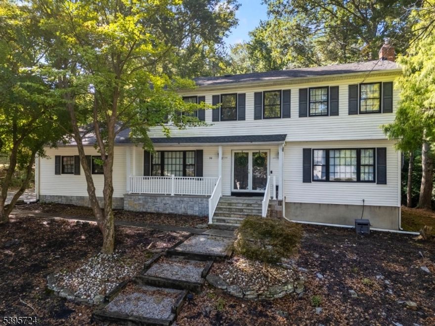 Welcome to this spacious 5 BR, 2.5 bath Colonial located in one of Marlboro's most desirable neighborhoods. Most of the home has been beautifully renovated, with kitchen and primary bath awaiting your personal touch. Main level offers large LR, formal DR, and a fifth BR that also makes an ideal home office. Enjoy a new custom fireplace mantle in the family room and functional eat-in kitchen. Upstairs features four additional bedrooms, including primary suite with attached bath ready for updates. The home also includes a full basement and spacious side-entry two-car garage. The backyard is surrounded by mature trees, offering a private, natural setting. Conveniently located near top-rated Marlboro schools, shopping, parks, and commuter routes.