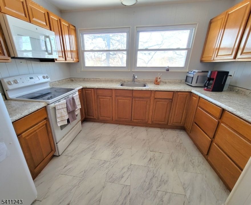 Welcome to High Point Country Club. This spacious 2-bedroom, 1 bath lakefront condo is an upstairs unit with beautiful views of the lake and lake access directly in the back yard! Perfect for paddleboards, rowboats, fishing, etc. Hardwood floors throughout the unit with an oversized living room directly off the kitchen for a large open feel and plenty of space to entertain. A 3-season sunroom off the living room with two large sized bedrooms down the hallway. Enjoy all of the amenities that HPCC has to offer including a public golf course, lakefront restaurant, public pool, basketball courts, public beach for swimming, playground, dog park, driving range, tennis courts, and so much more. Just minutes to the High point state park and historic Milford PA. Very well-maintained unit inside of a well-maintained building. Come and take a look and see why this rental at this price will not last long!