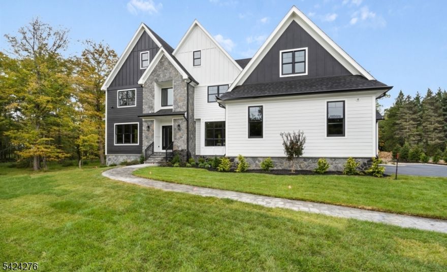 Welcome to The Enclave at Brookside - a new gated community where luxury meets privacy. This new construction estate sits on over 2 acres and offers 5,512 sq. ft. of refined living space with 6 bedrooms and 5.1 baths. Highlights include a chef's kitchen with Viking appliances, soaring ceilings, custom woodwork, and light-filled open-concept living areas, perfect for entertaining. The primary suite boasts a spa-like en-suite bath and expansive walk-in closets, while each additional bedroom features an en-suite bath, high-end finishes, and custom closets. Enjoy the tranquil outdoor setting, perfect for peaceful living and relaxation, all just 33 miles from New York City. Don't miss the opportunity to own this exceptional home that combines elegance, comfort, and convenience.