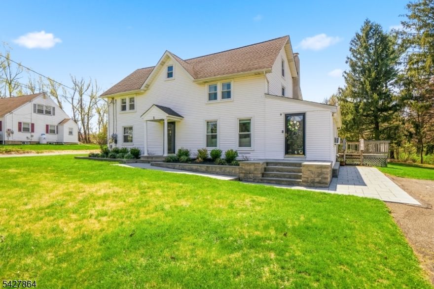 A rare and versatile opportunity in highly sought-after Randolph, this side-by-side, two family home offers flexibility, privacy, and long-term value on an expansive 1.9-acre property. Beautifully landscaped with a new (2023) paver stone front entry. Whether you're looking for a home for yourself with the ability to live in one unit while generating rental income from the other or an investment, this property checks every box. Unit A features 3 bedrooms and 1.5 baths, with a spacious layout including a living room, dining room, and full kitchen. This unit has an attic and access to the shared deck and a Bilco-door basement, ideal for storage and laundry. Unit B offers 2 bedrooms and 1 full bath, with a comfortable living/dining combo, full galley kitchen, and a walk-up attic providing additional storage or expansion possibilities. Both units feature hardwood floors, radiator heat, and window A/C units. Major updates include a newer roof and furnace (approximately 10 years old), chimney (2025) and new windows installed in 2024. Set on a private, oversized lot with a peaceful, quiet setting, the outdoor space offers plenty of room to entertain, relax, or just enjoy. Conveniently located near major highways, shopping, and schools. Top-rated Randolph school district. This is a unique property with endless potential for home owners and investors alike. Deck is "as-is."